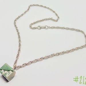 Green Bakelite stone with rhinestones necklace.